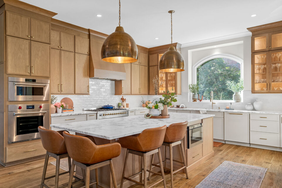 Created by Haggard Home Cabinetry & Design Door Style/Color: Portrait Oak Sand and Portrait Maple Beige