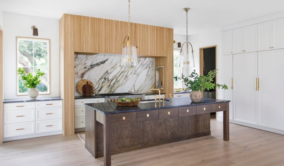 Door Style/Color: Eudora Brighton Alabaster and Island KithOne Metro Nutmeg Created by Jilco Kitchen and Bath and Photo by: margaret-wright.com